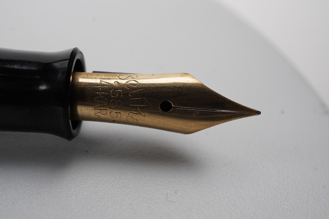 A Pelikan 100N fountain pen fitted with a 14ct. gold Pelkan nib